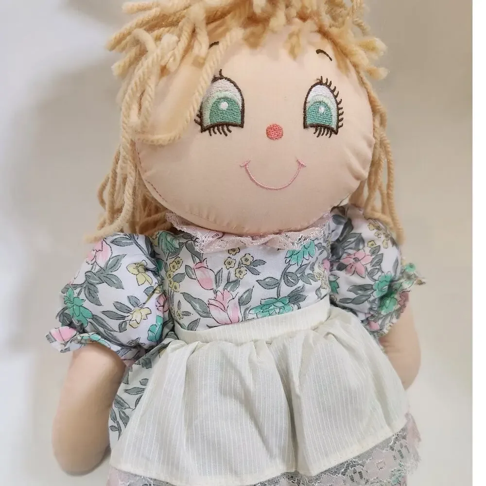Vintage 1980s Commonwealth soft plush doll with dress 16